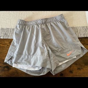 2 Nike shorts with built in compression shorts